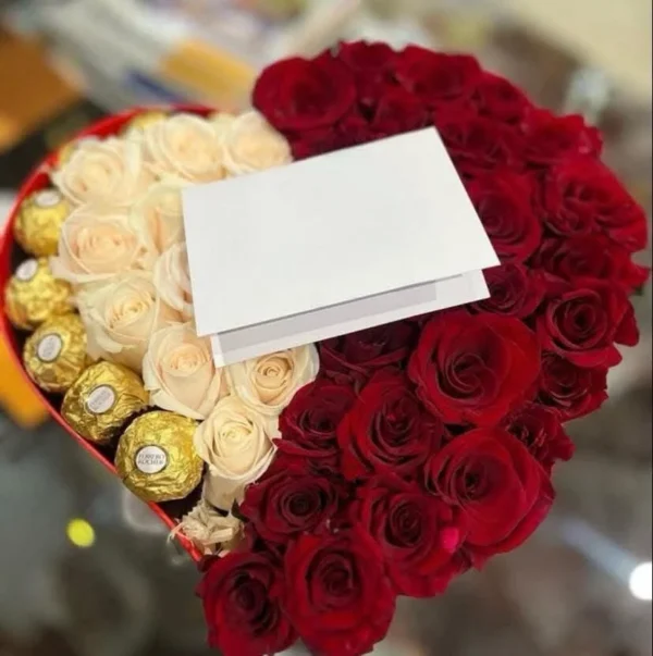 Heart box with red and cream roses and chocolates